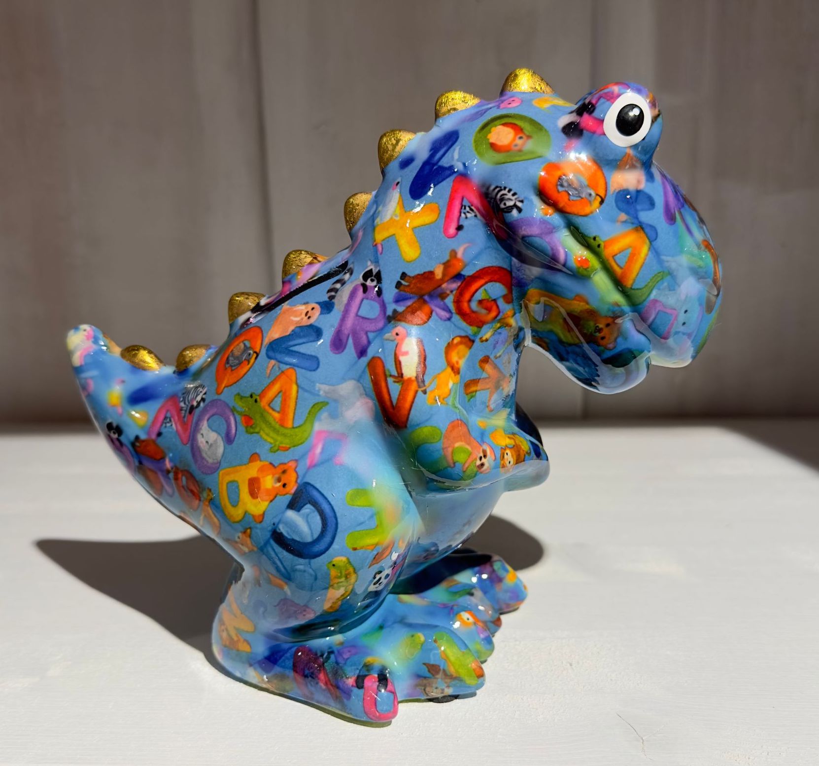 Pomme pidou Spardose Dino Tito in Blau - ABC