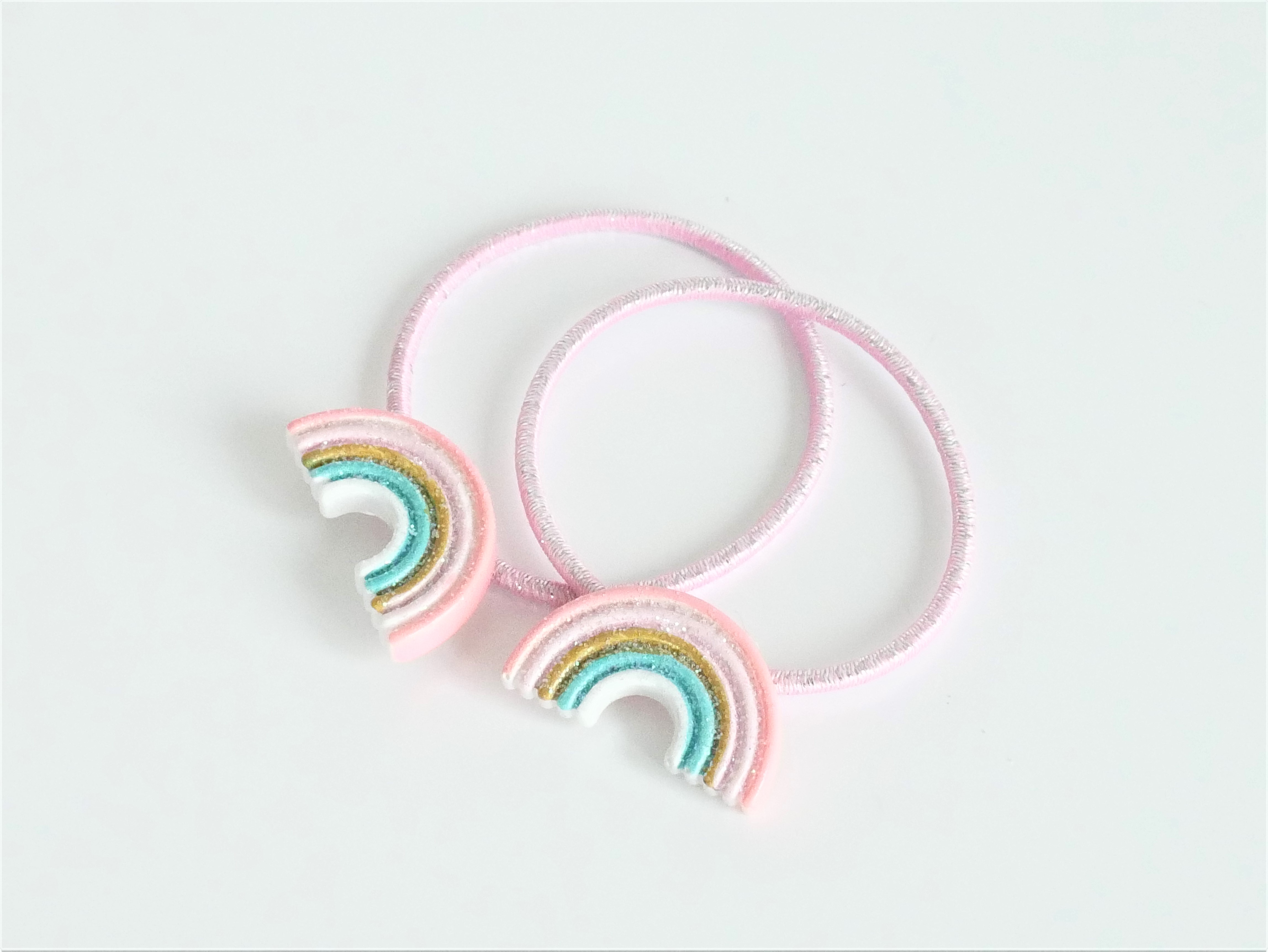 2Qri7TYXwLhCV6T KisMe Haargummis mit Regenbogen & Glitzer - 2 Stück