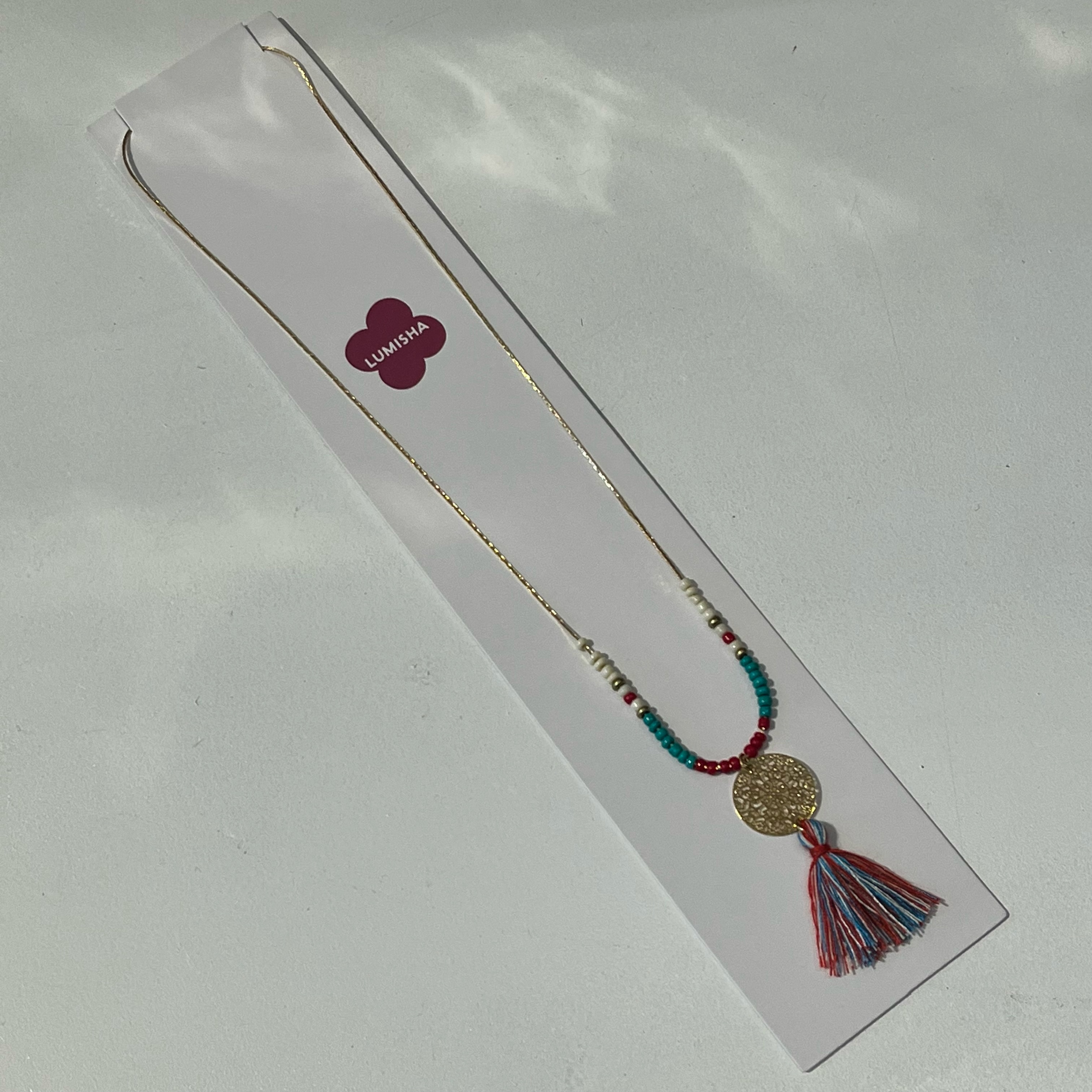 image2-3 Lumisha Xana Kette mit Medaille & Quaste in Türkis, Rot & weiß