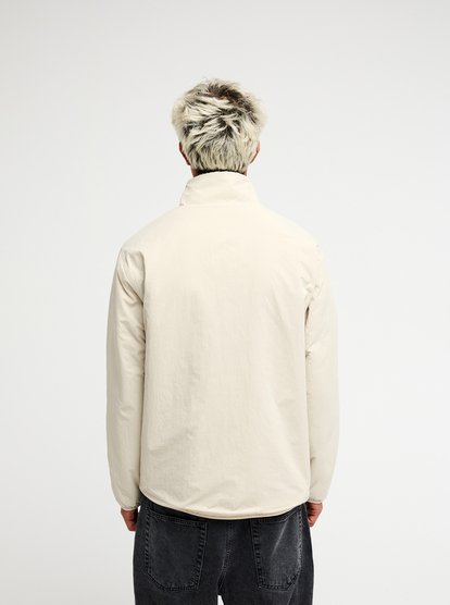 Quiksiilver Urban Storm Reversible Sherpa Teddy Fleecejacke & Windbreaker zum Wenden in Creme Quiksiilver Urban Storm Reversible Sherpa Teddy Fleecejacke & Windbreaker zum Wenden in Creme