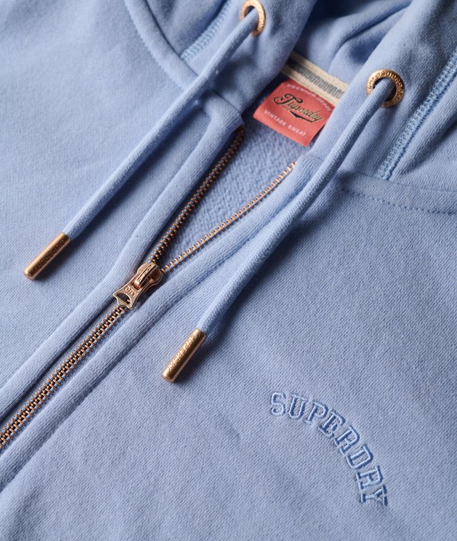 Superdry Damen Kapuzenjacke mit gesticktem Logo in Blau mit Roségold Reißverschluss Superdry Damen Kapuzenjacke mit gesticktem Logo in Blau mit Roségold Reißverschluss