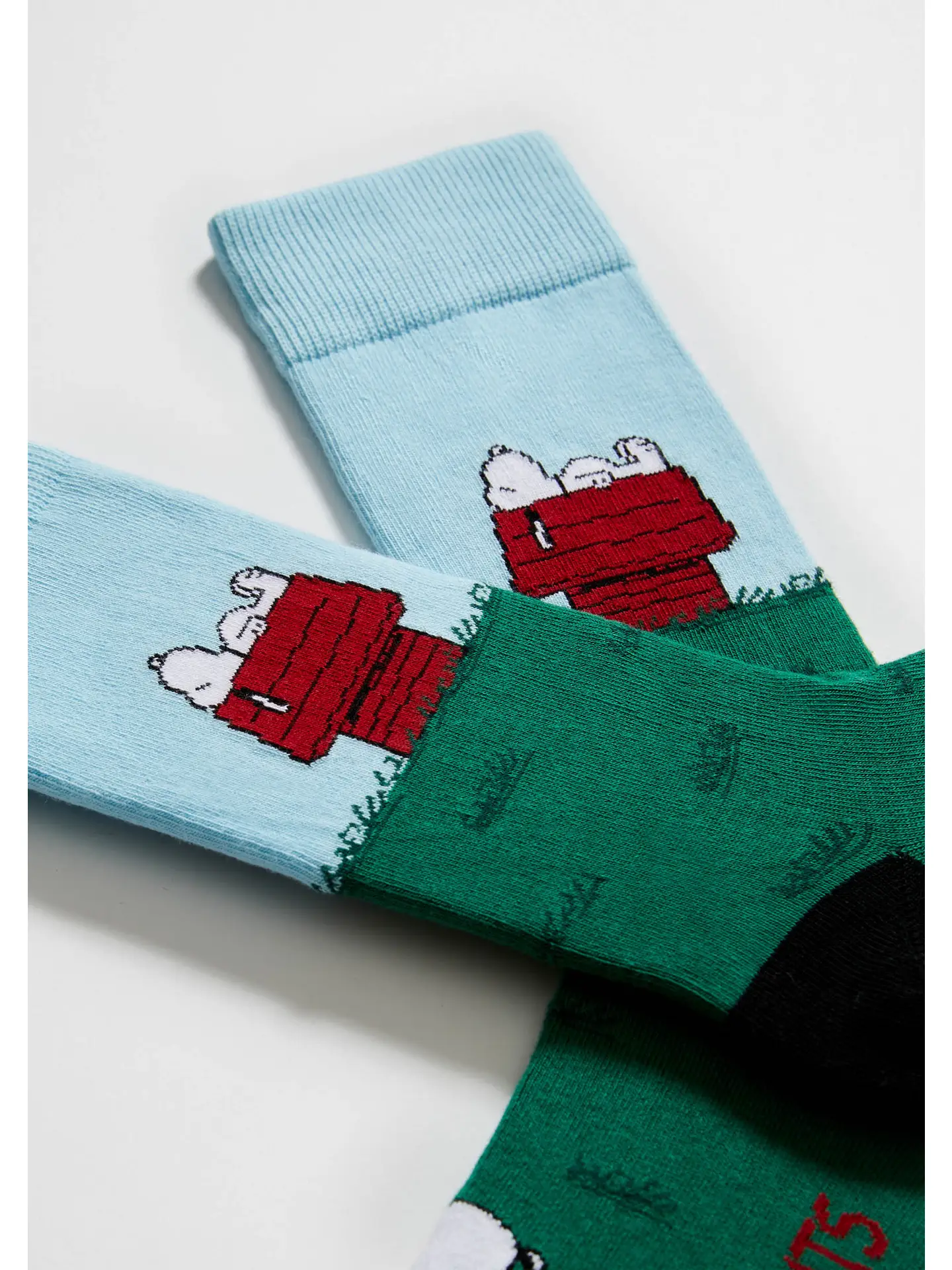 besocks Peanuts aus Bio-Baumwolle in Blau & Grün - BeSnoopy Haus besocks Peanuts aus Bio-Baumwolle in Blau & Grün - BeSnoopy Haus