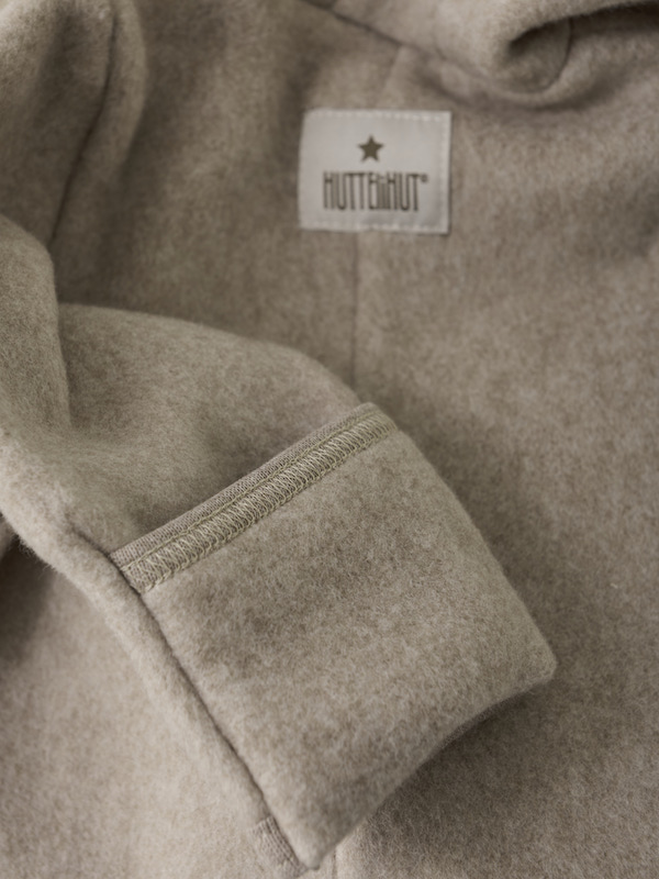 HUTTEliHUT Baumwolle Fleece-Overall in Beige mit Öhrchen 