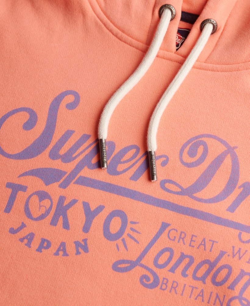 Superdry Damen Tokyo London Hoodie in Neon Coral mit Flieder Schrift