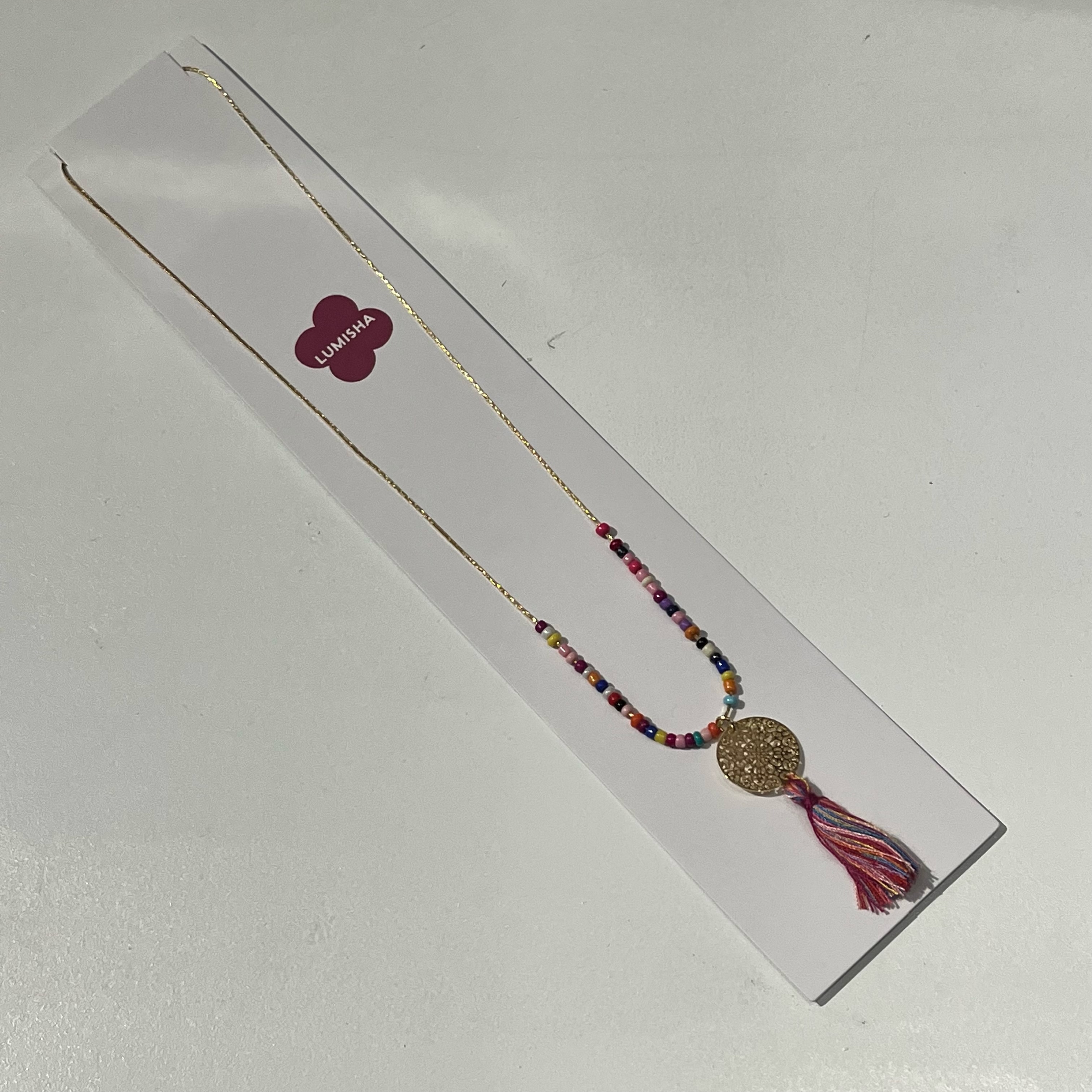 image2-1aYdHFUDljB57C Lumisha Xana Kette mit Medaille & Quaste in Multifarben