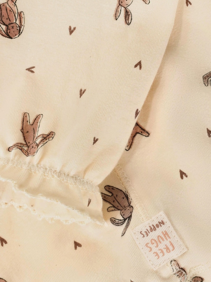 Noppies Baby Mädchenhose in Buttercreme mit Hasen Allover und Schleife – GOTS Bio-Baumwolle Noppies Baby Mädchenhose in Buttercreme mit Hasen Allover und Schleife – GOTS Bio-Baumwolle