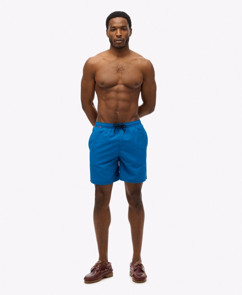 Superdry Herren Premium EMB 17 Badeshorts mit Stickerei in Twilight Blue - Blau Superdry Herren Premium EMB 17 Badeshorts mit Stickerei in Twilight Blue - Blau