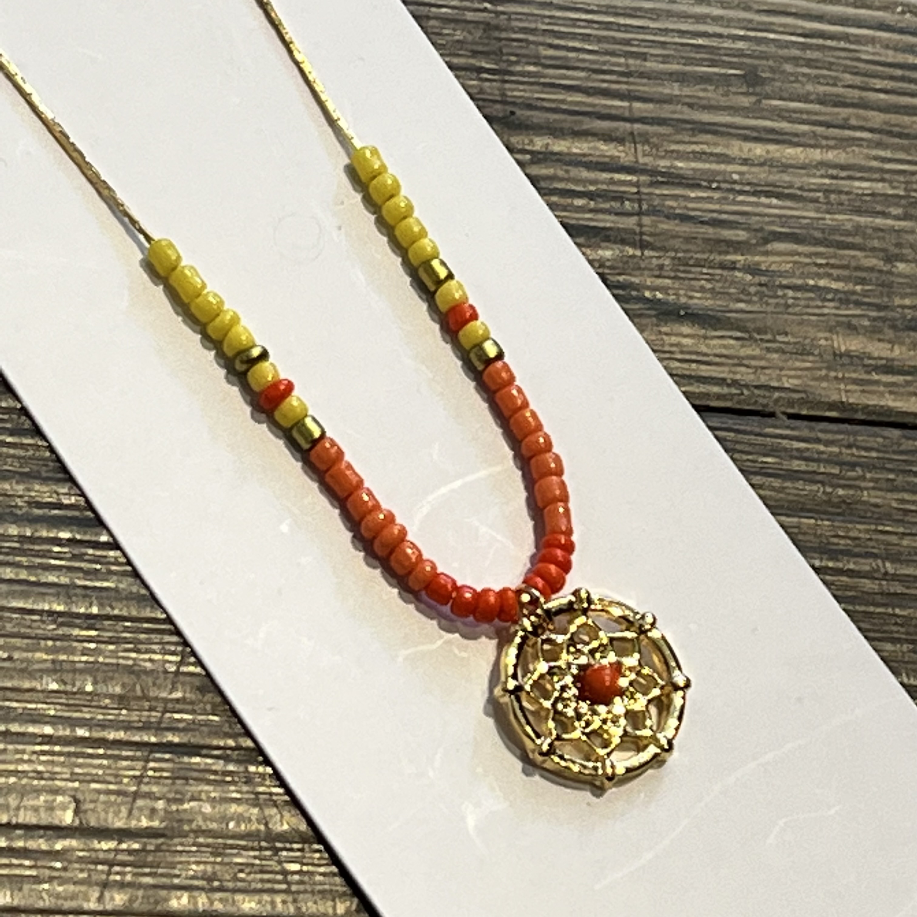 Lumisha Xana Kette mit Medaille - Orange & Gelb