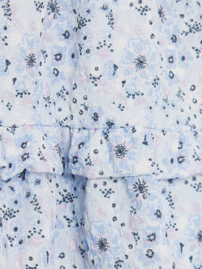Creamie Rock in Buttercreme mit Struktur - Heather Blau Blumen Allover