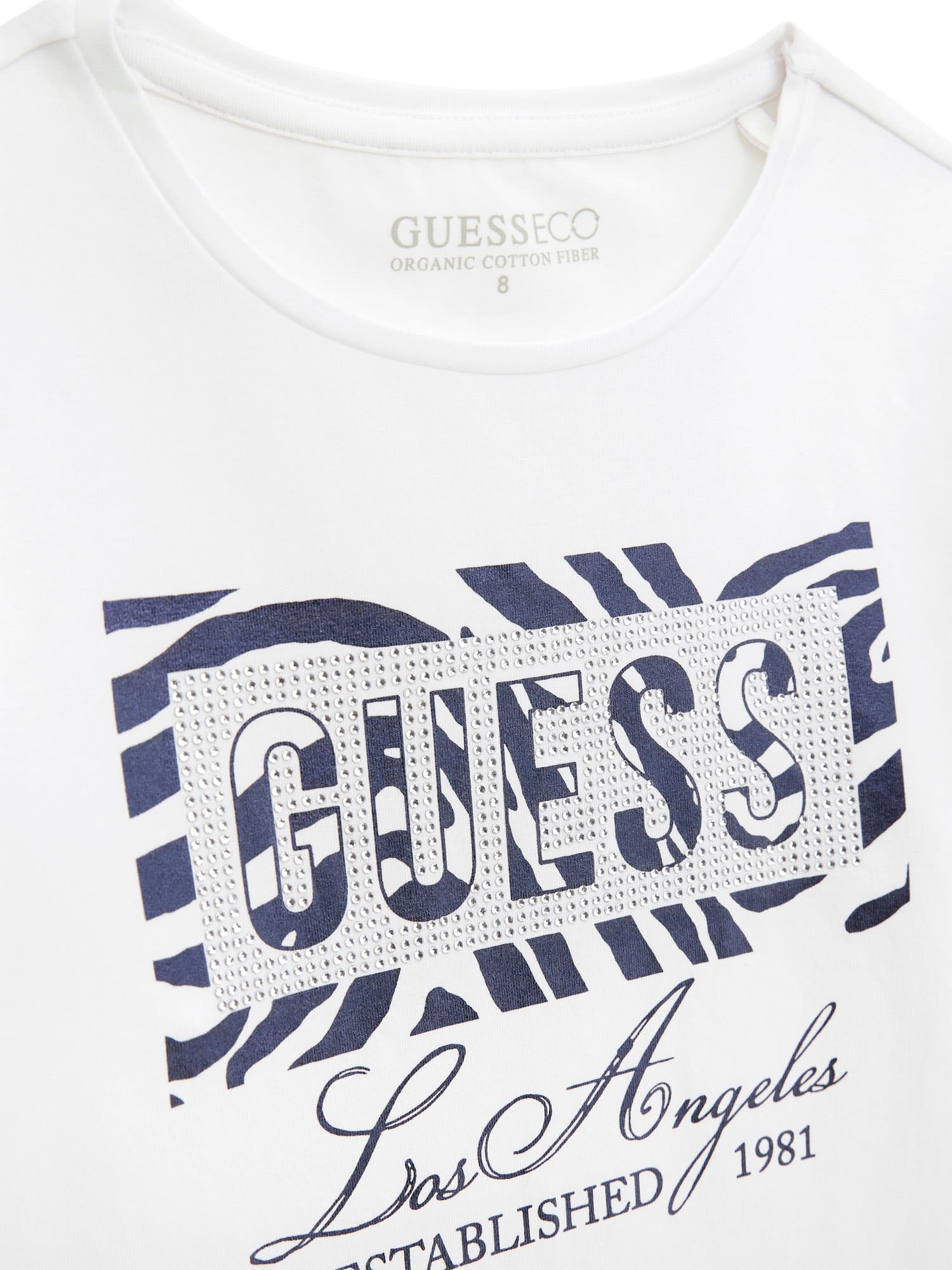 Guess Langarm Shirt in Weiß mit Guess Logo Zebra & Pailletten Guess Langarm Shirt in Weiß mit Guess Logo Zebra & Pailletten