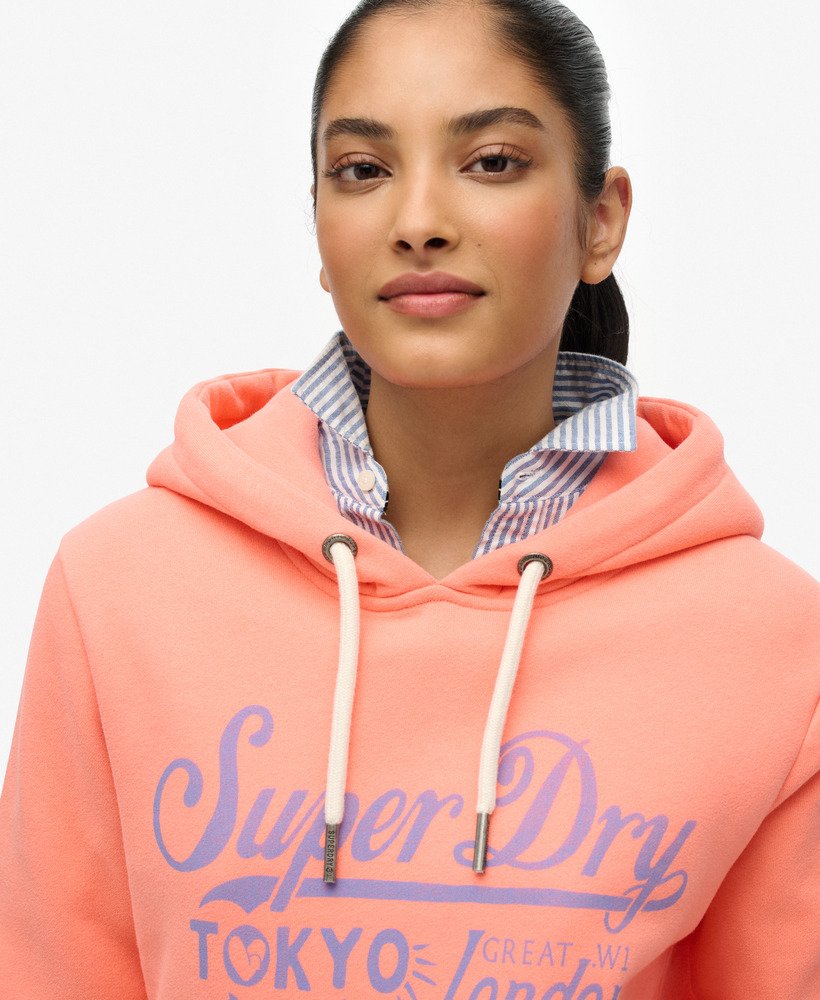 Superdry Damen Tokyo London Hoodie in Neon Coral mit Flieder Schrift