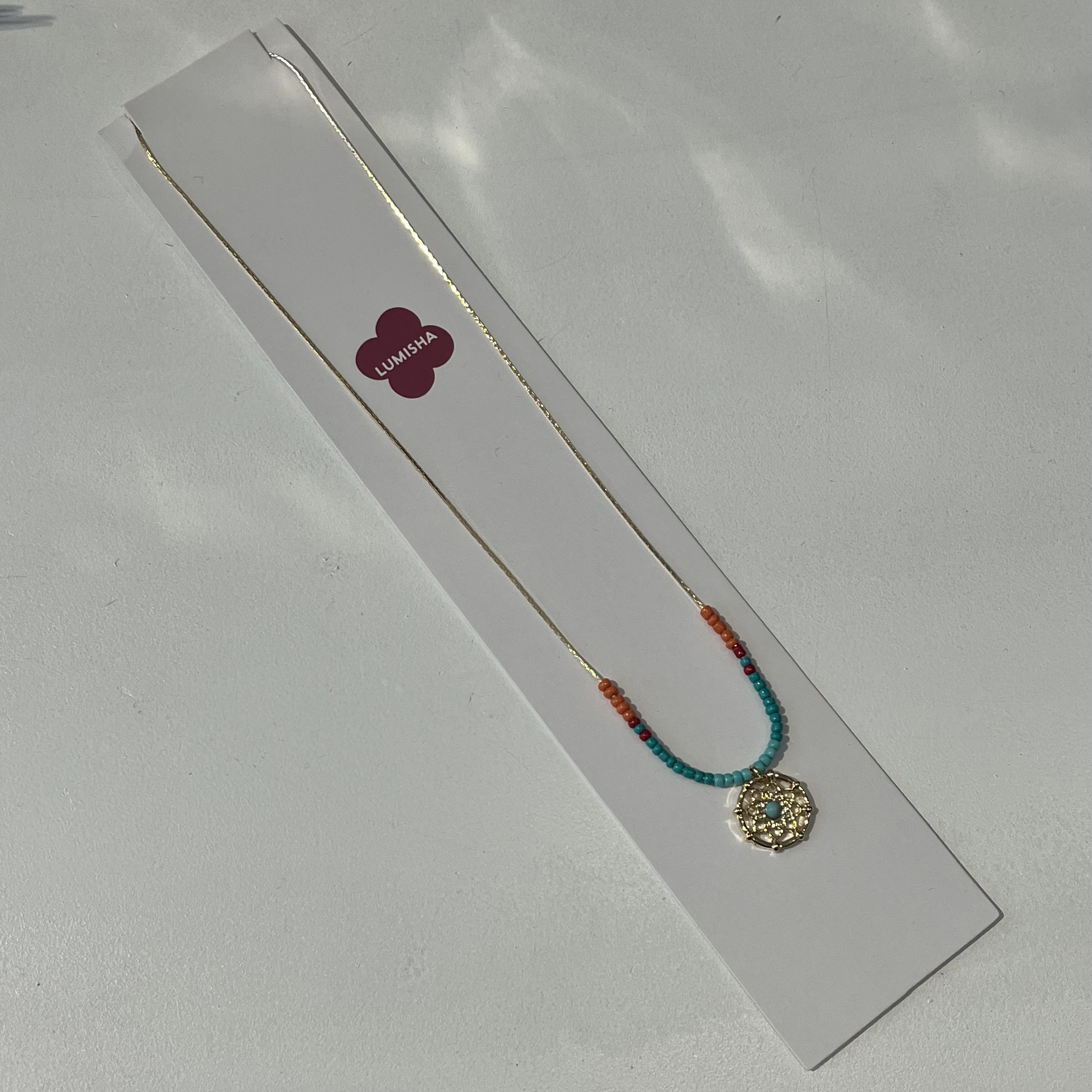 Lumisha Xana Kette mit Medaille - Türkis, Orange & Rot